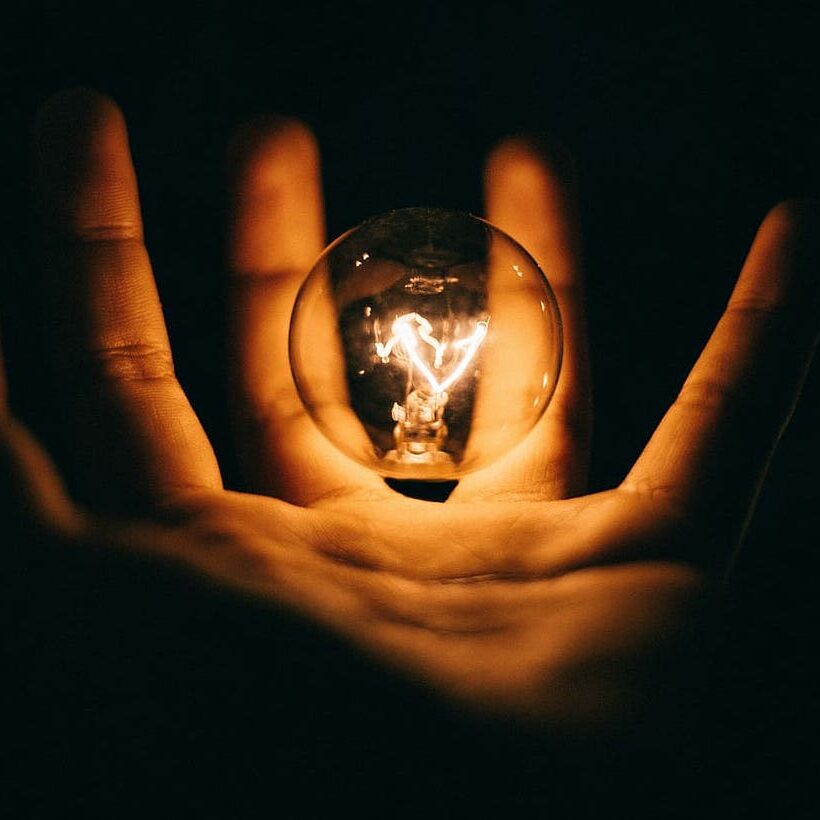 hand-bulb-lightbulb-filament